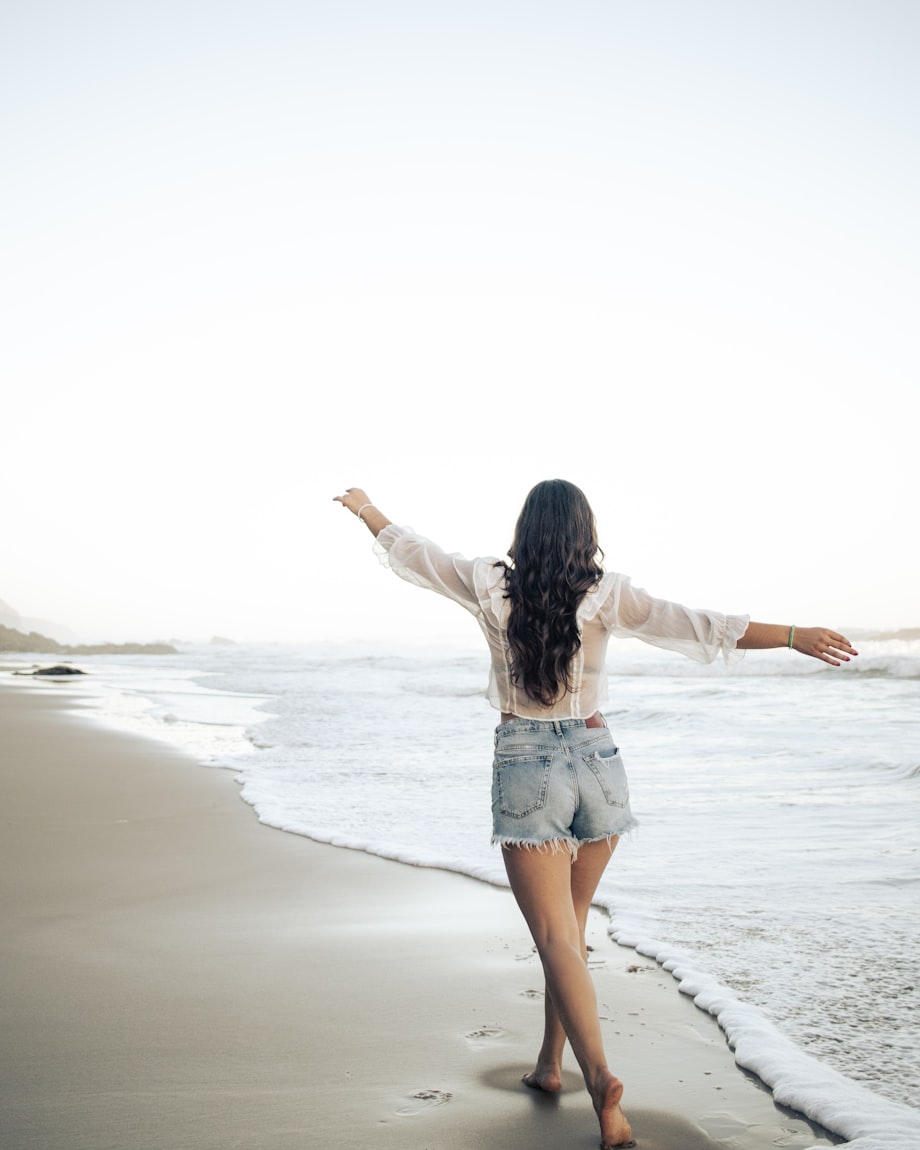 Woman walking on the beach